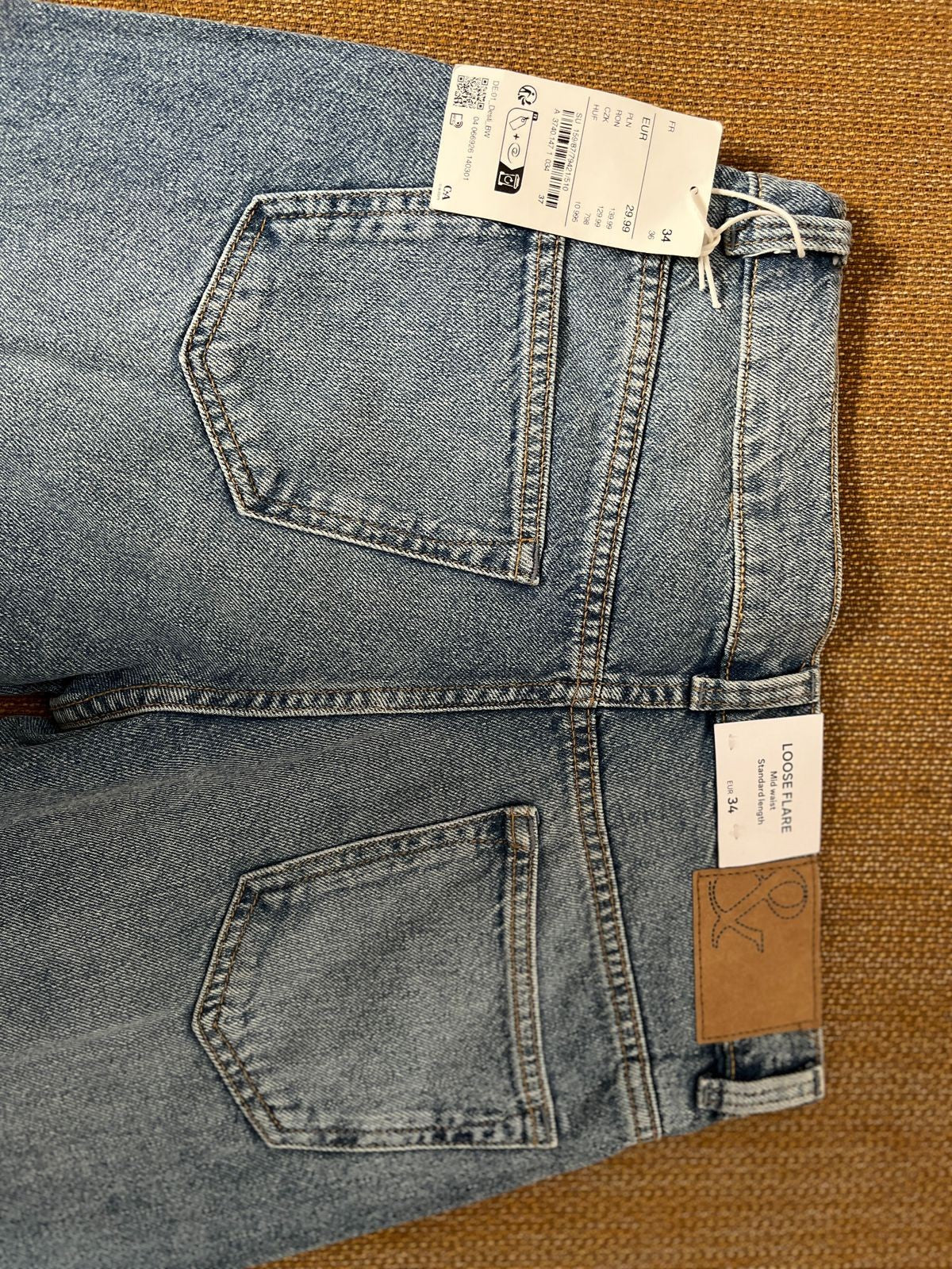 MID RISE LOOSE FLARE JEAN