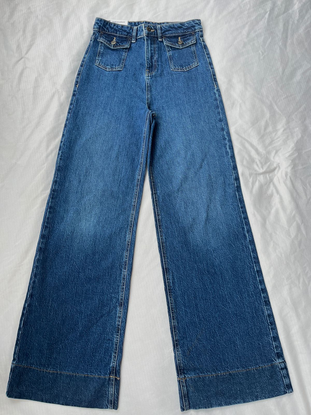 HIGH RISE FRONT POCKET DETAIL WIDE LEG JEAN
