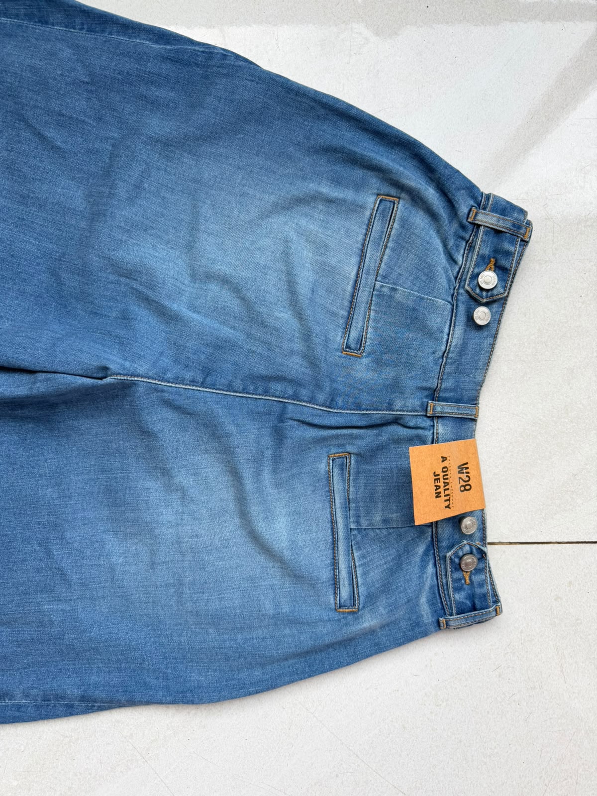 HIGH RISE PLEATED WIDE LEG JEAN