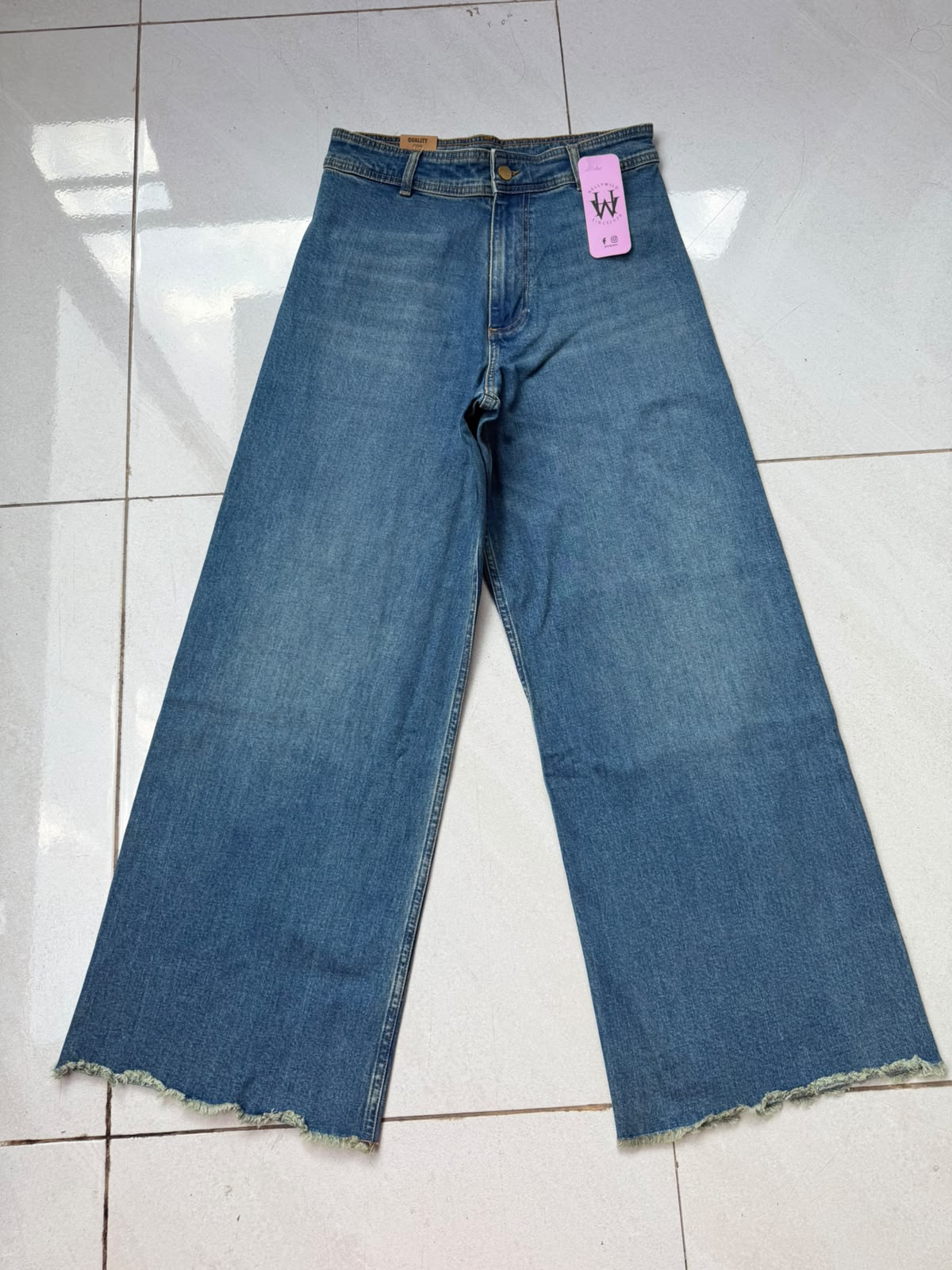Imported High-Rise Raw Hem Wide-Leg Jeans